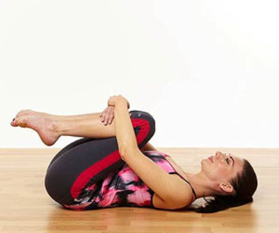 Knæ til bryst - yoga god til stress