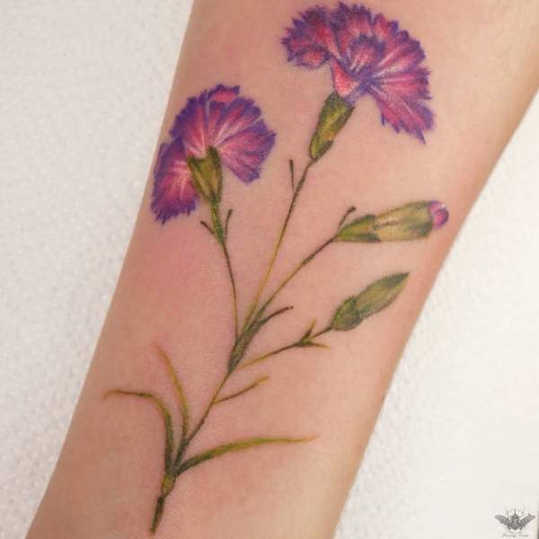Nelliker tatovering på armen