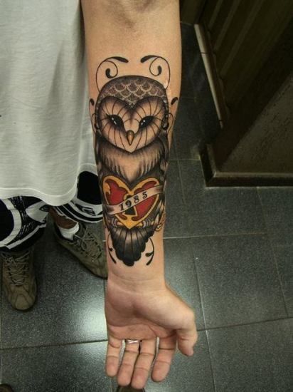 Underarm ugle tatovering