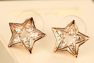 Stjerneformet guld øreringe Design