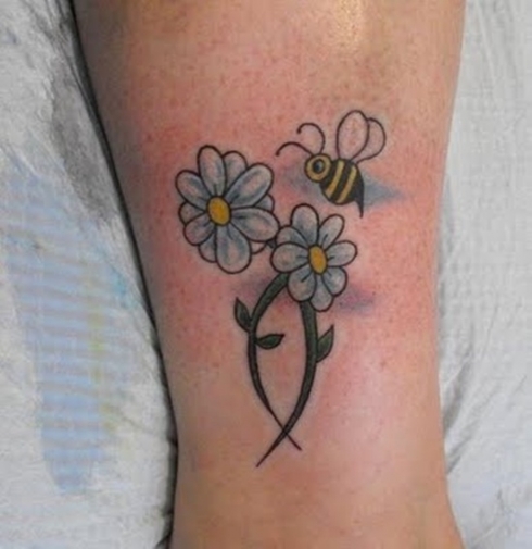 Daisy tetoválás a csuklón