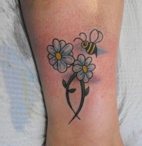 Daisy Tatoveringer på håndleddet