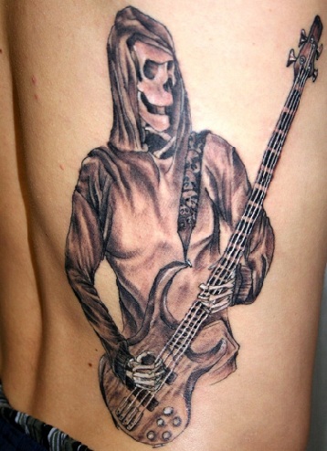 Rock Star -skelet med guitar -tatovering