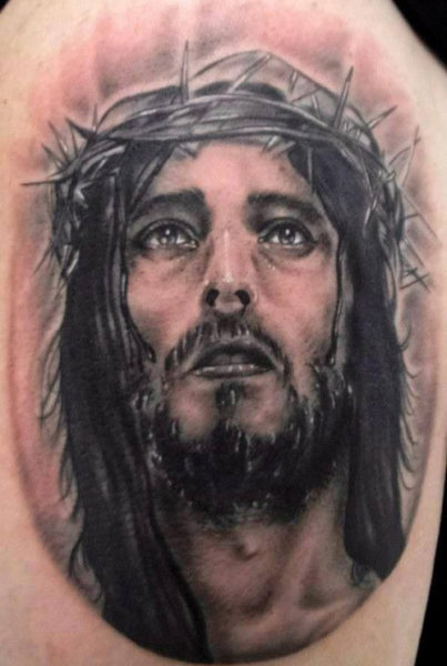 Jesus Face Tattoo On Arm