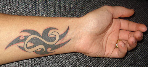 Oroszlán állatöv szimbólum tetoválás