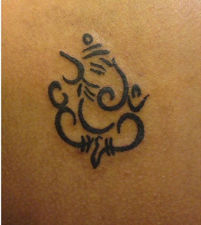 Lille symbolsk Ganesh -tatovering