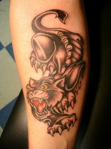 Angry Artistic Panther Tattoo