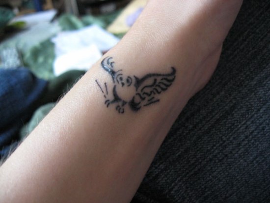 Abstrakt hånd ugle tatoveringer