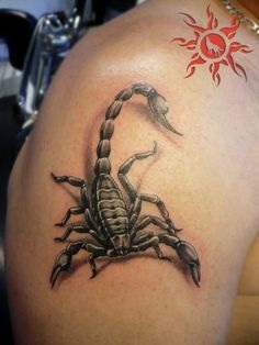 A Sun Scorpion tetoválás a karon