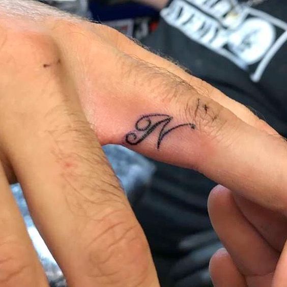N Letter Finger Tattoo