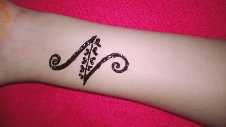 Mehendi N Letter Tattoo