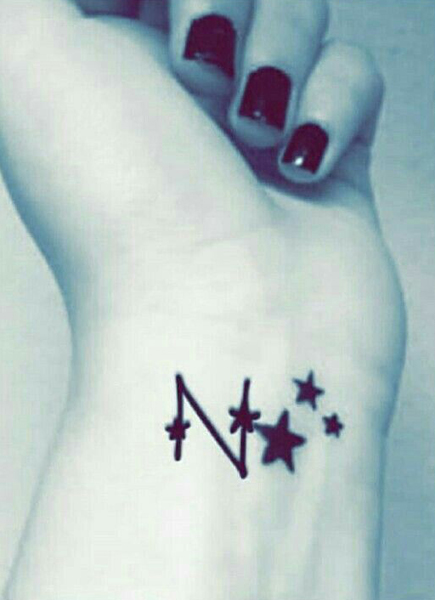 Starry N Letter Tattoo Design