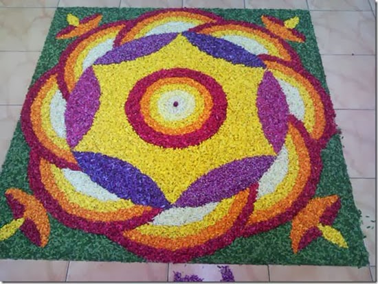 Virág Rangoli körkörös mozdulatokkal