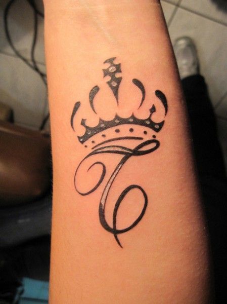 Royal C Letter Tattoo On The Arm