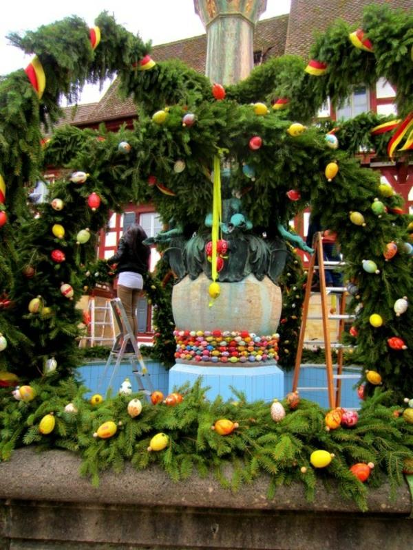 pääsiäissuihkulähde frankinkielinen sveitsi perinne ripustaa seppeleitä