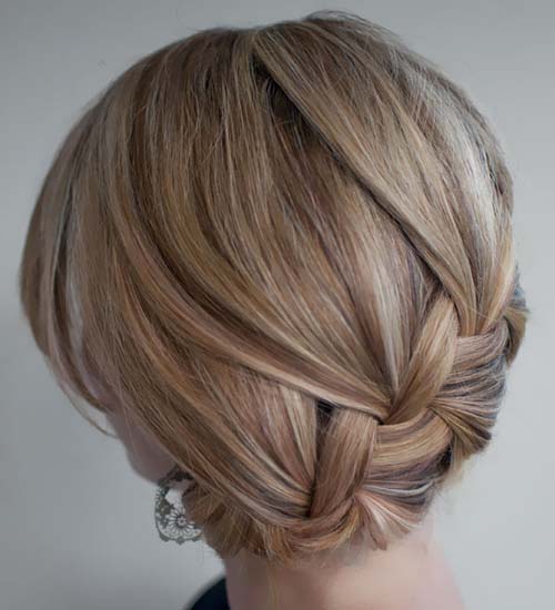 Updo med klassiske snoede fletninger