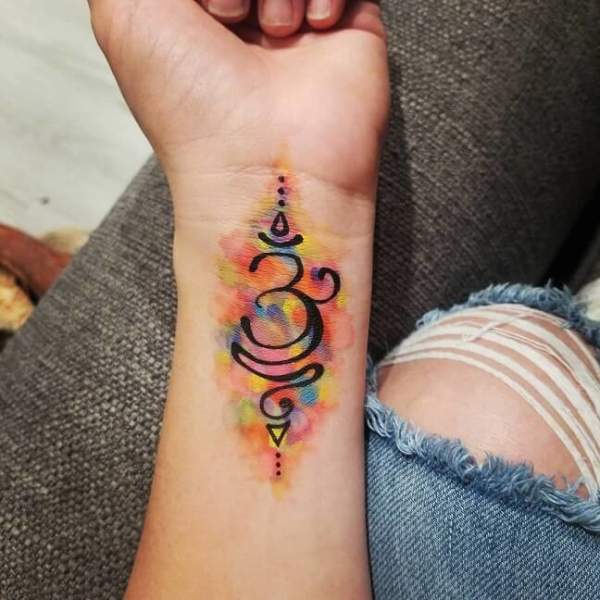 Om Tattoo Design On Wrist