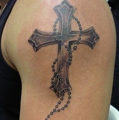 Rózsafüzér kitöltötte Krisztus tetoválását a fegyvereken