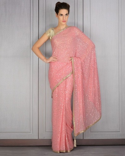 Nyeste designer pink saree med skinnende guldudsmykning