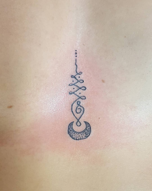 Quirky in Between Breast Tattoo Ideas