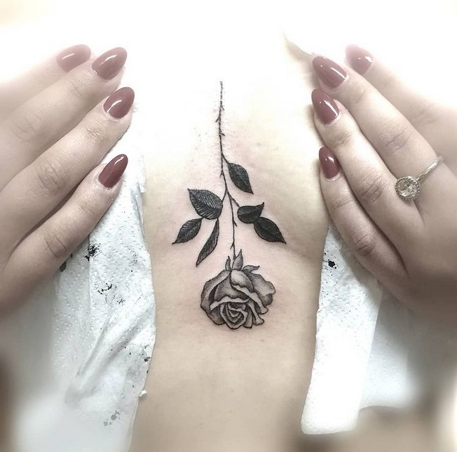 Mellem The Breast Rose Tattoo