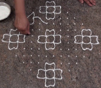 Enkel og let blomst 14 prikker Rangoli