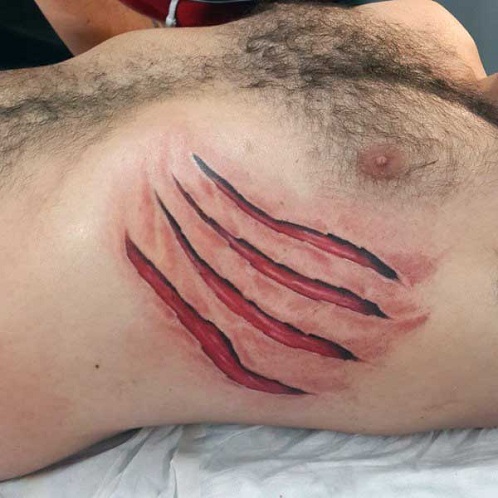 Lenyűgöző szakadt bőr tetoválás