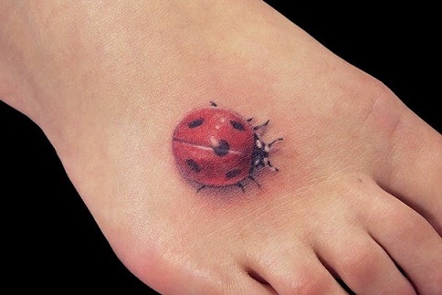 Elegant Lady Beetle Tattoo Design