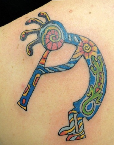 Flerfarvet Kokopelli tatovering