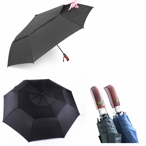 Tre foldbare vindtætte paraplyer