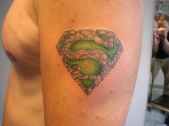 Superman Symbol Stone Work Tattoo Design