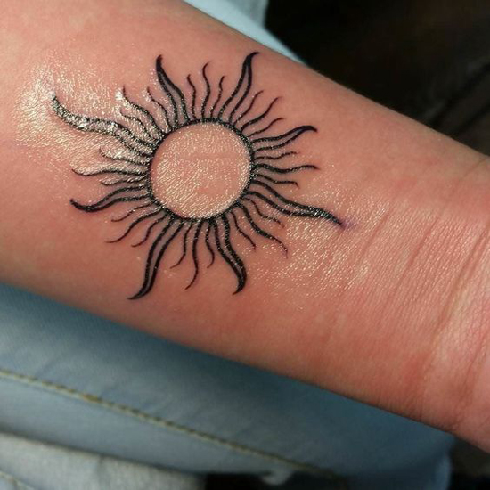 Tribal Sun Tattoos 9