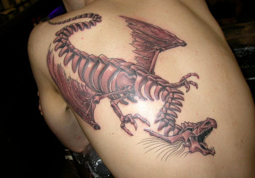 Skeletal Dragon Tribal Tattoo