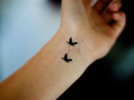 Små feminine tatoveringer