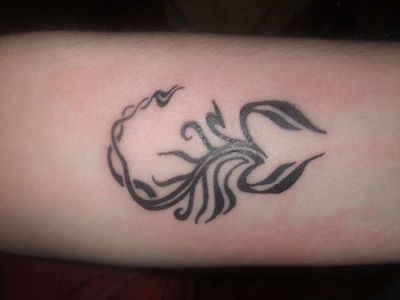 Underarm Tribal Scorpion Tattoo