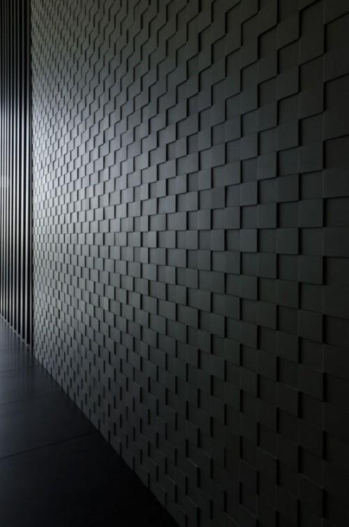 Korostusseinä moderni seinärakenne käytävällä 3D -paneelit tummanharmaa