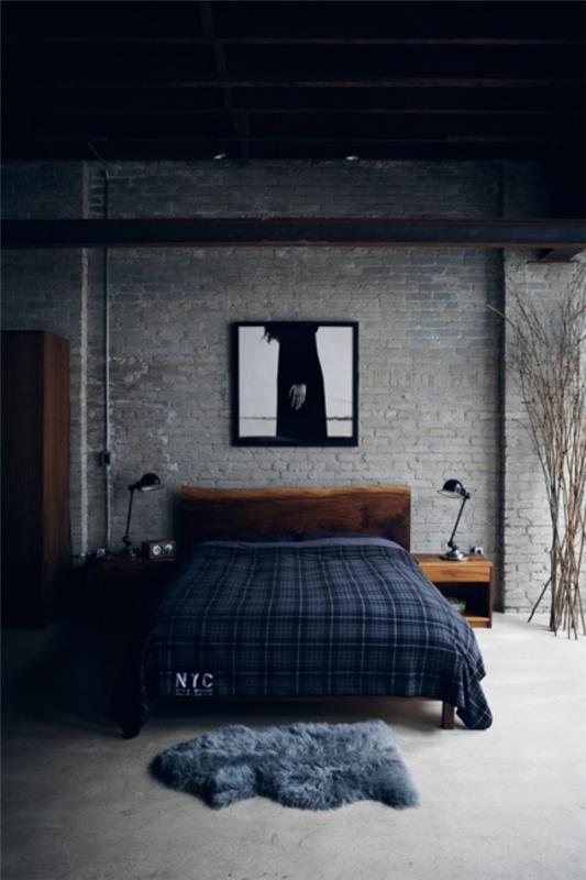 Tiiliseinä makuuhuoneessa moderni muotoilu harmaalla ja tummansinisellä erittäin houkutteleva tunnelma
