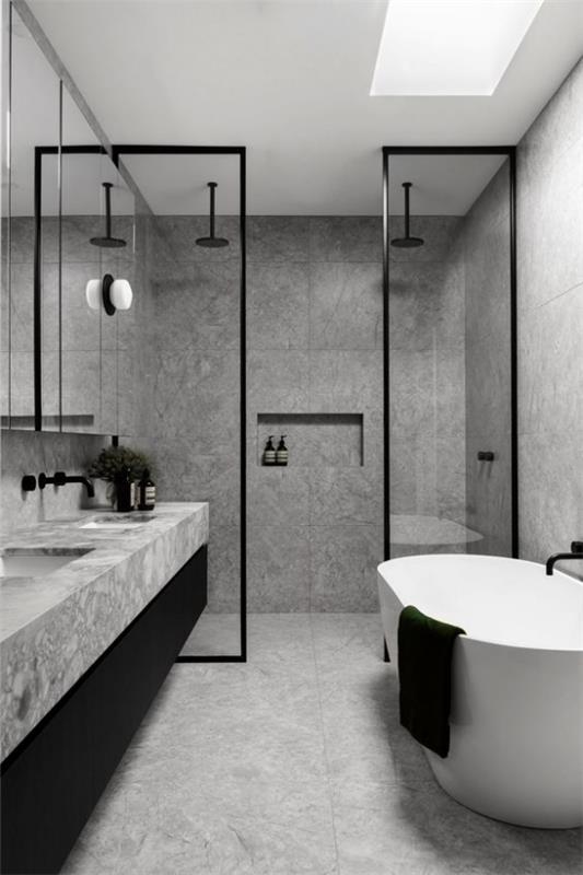 Kylpyhuoneen muotoilu harmaa, hallitseva väri harmaa, pienet aksentit mustalla, irrallinen kylpyamme, valkoinen