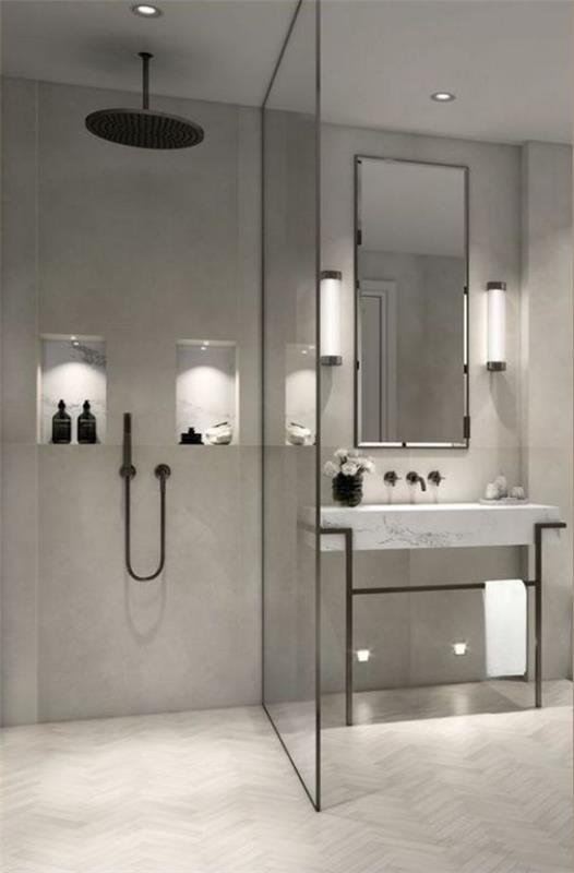 Kylpyhuoneen mallit harmaassa minimalistisessa kylpyhuoneessa