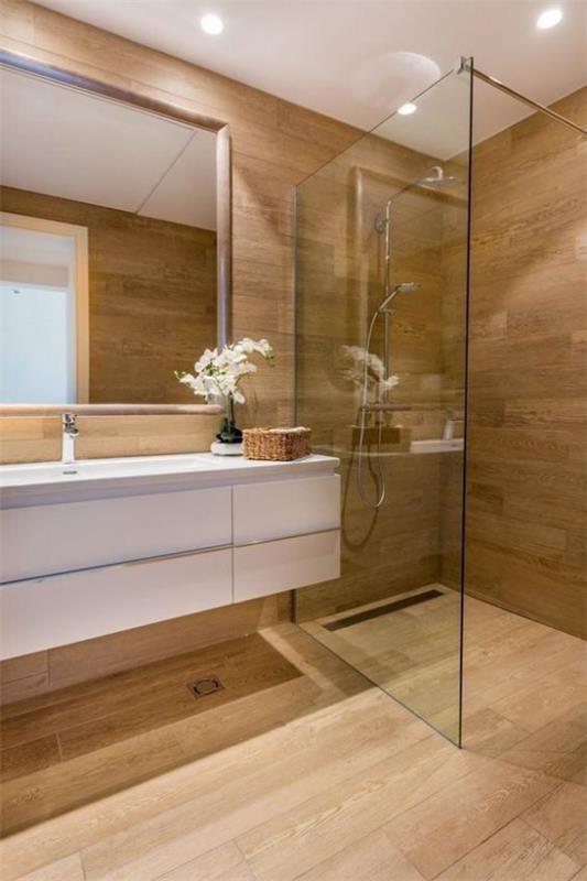 Kylpyhuoneen trendit 2021 suihkunurkka -pesuallaslaatat ja puu näyttävät hyvältä käytöstä modernissa kylpyhuoneessa