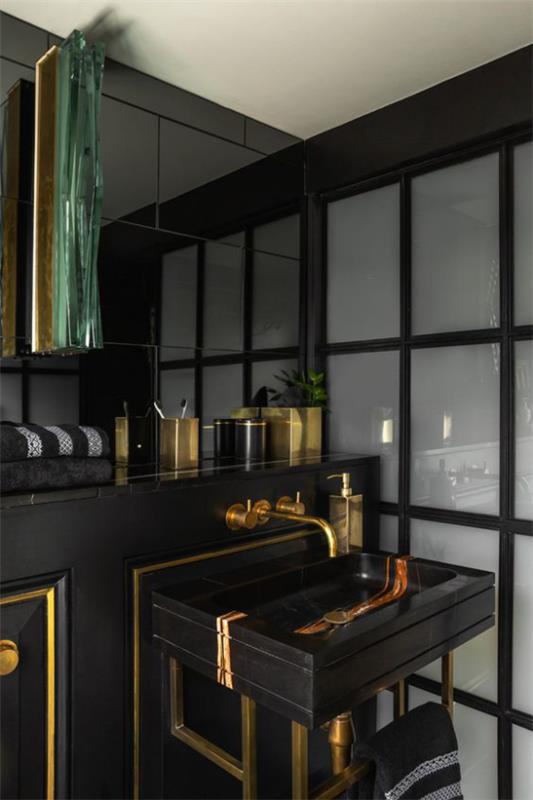 Kylpyhuone musta ja kultainen väliseinä matta lasi musta turhamaisuus varusteet kullan kiiltoa