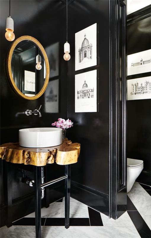Kylpyhuone musta ja kulta turhamaisuus puu valkoinen pesuallas mustat seinät