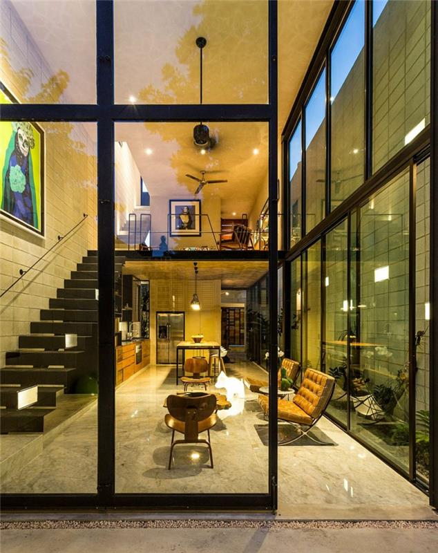 Casa Desnuda Merida Meksiko Moderneissa taloissa on lattiasta kattoon ulottuvat ikkunat