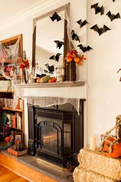 Halloween -koriste -ideat koristavat takan, valitse oranssi ja musta