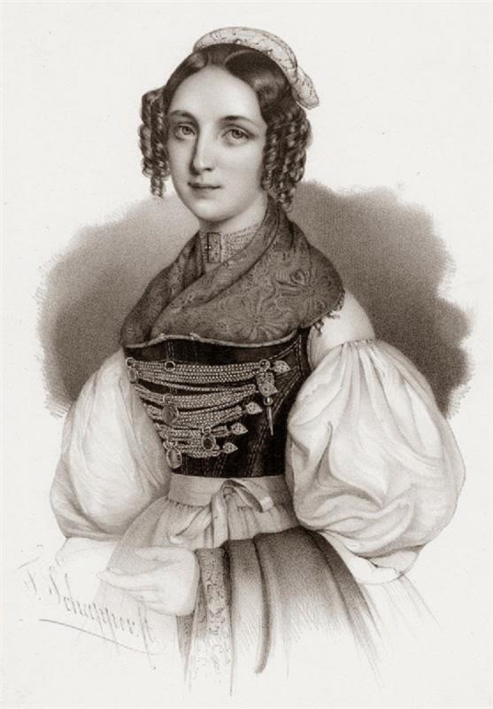 Dirndl kampaus kihara parta nainen