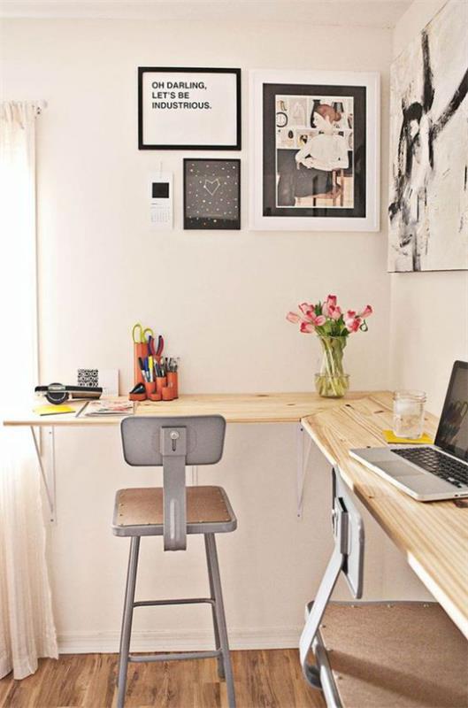 Kulmapöytä yksinkertainen kotitoimisto minimalistisesti suunniteltu tila kahdelle henkilölle