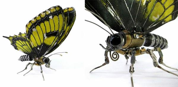 Käytetyt moottoripyörän osat kierrättävät veistoksia perhonen