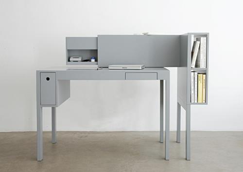 Halvat työpöydät toimiston harmaaseen tekstuuriin