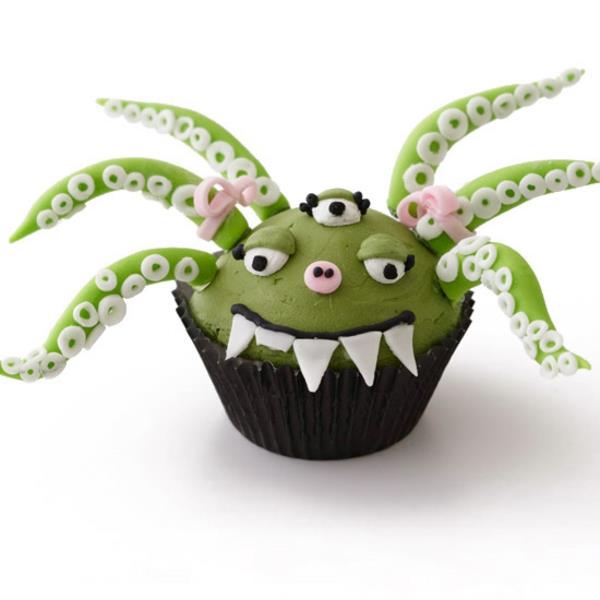 Pelottavia muffinsseja, jotka leivovat halloween -leivonnaisia ​​cupcakes ulkomaalaisia