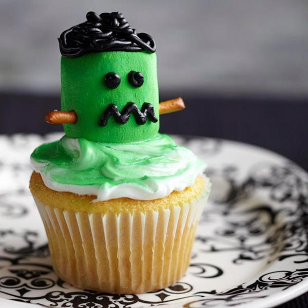 Kauhu muffinsseja leivonta halloween leivonnaisia ​​cupcakes vihreitä ulkomaalaisia